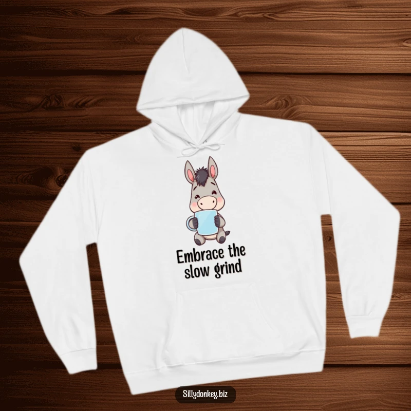 Funny kawaii donkey character, mugs in hand, looking tired but happy, warm and cozy hoodie design. Relatable sleepy humor.