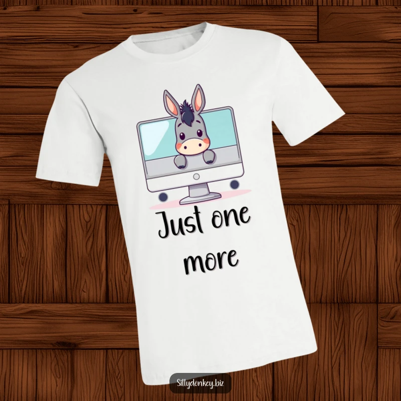 Funny t-shirt graphic of a kawaii donkey peeking over a large computer monitor, symbolizing gaming, technology, and humorous curiosity.