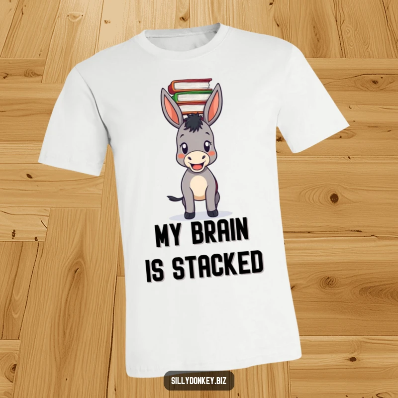 Funny t-shirt graphic of a donkey looking pleased, balancing a tall, unstable pile of documents on its head.